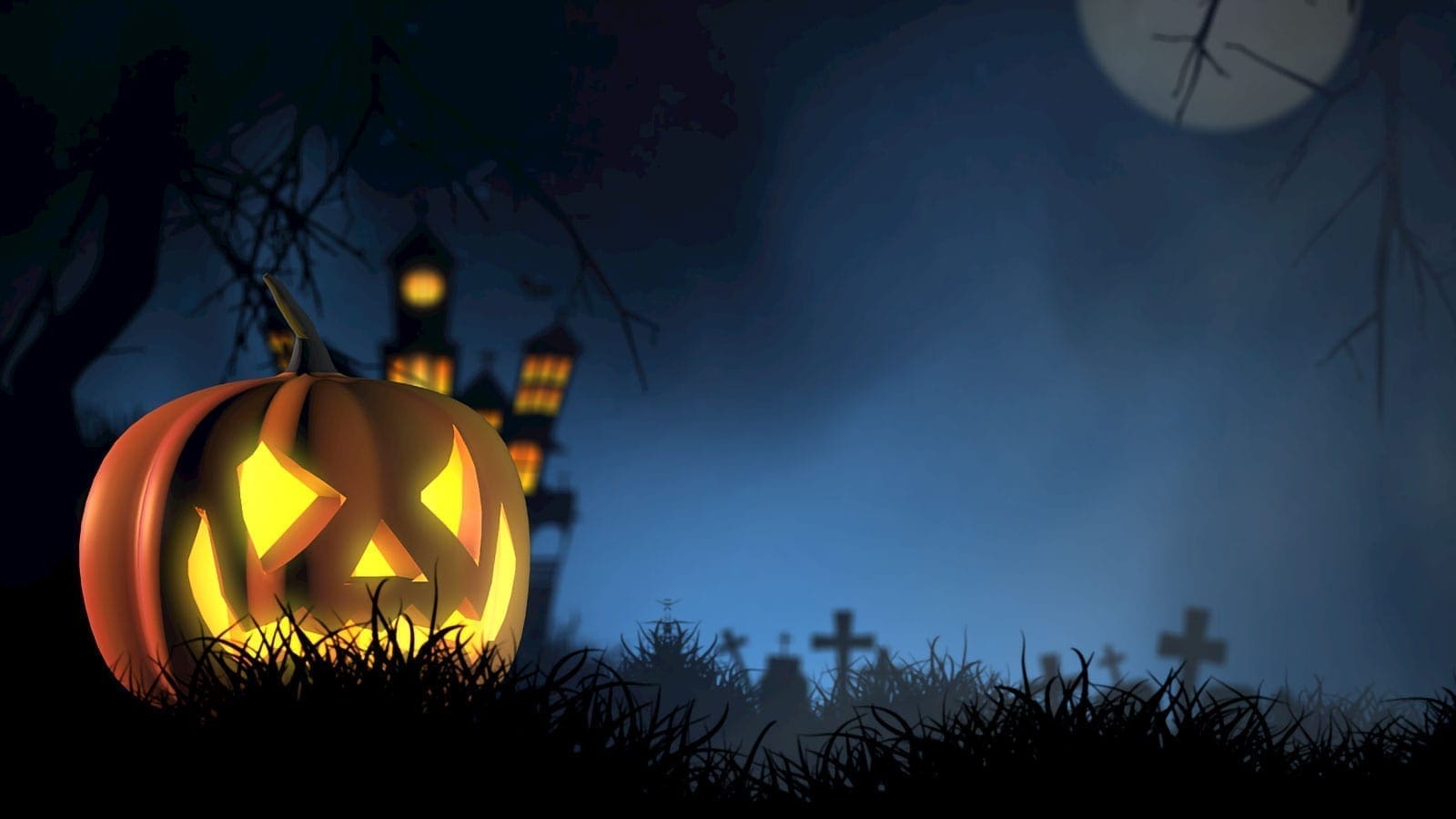 Halloween pumpkin in a graveyard